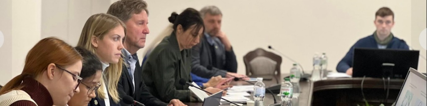 Louise Cuvillier speaking at a conference